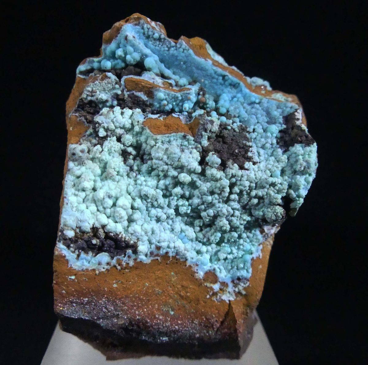 Glaucocerinite