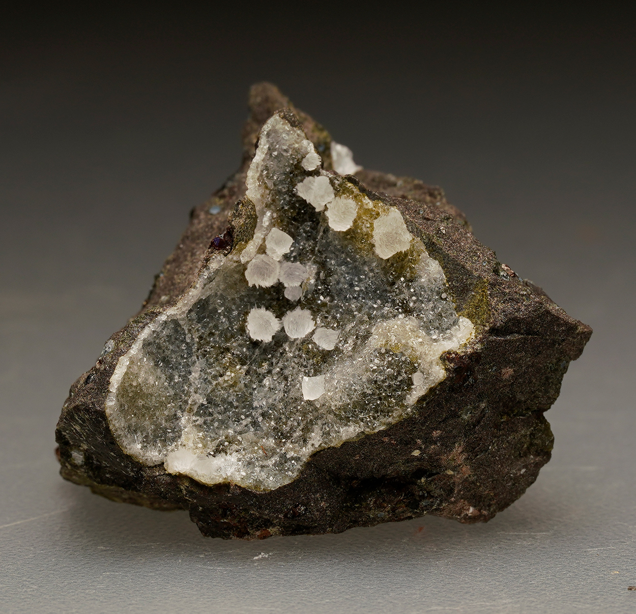 Thomsonite-Ca & Chabazite-Ca