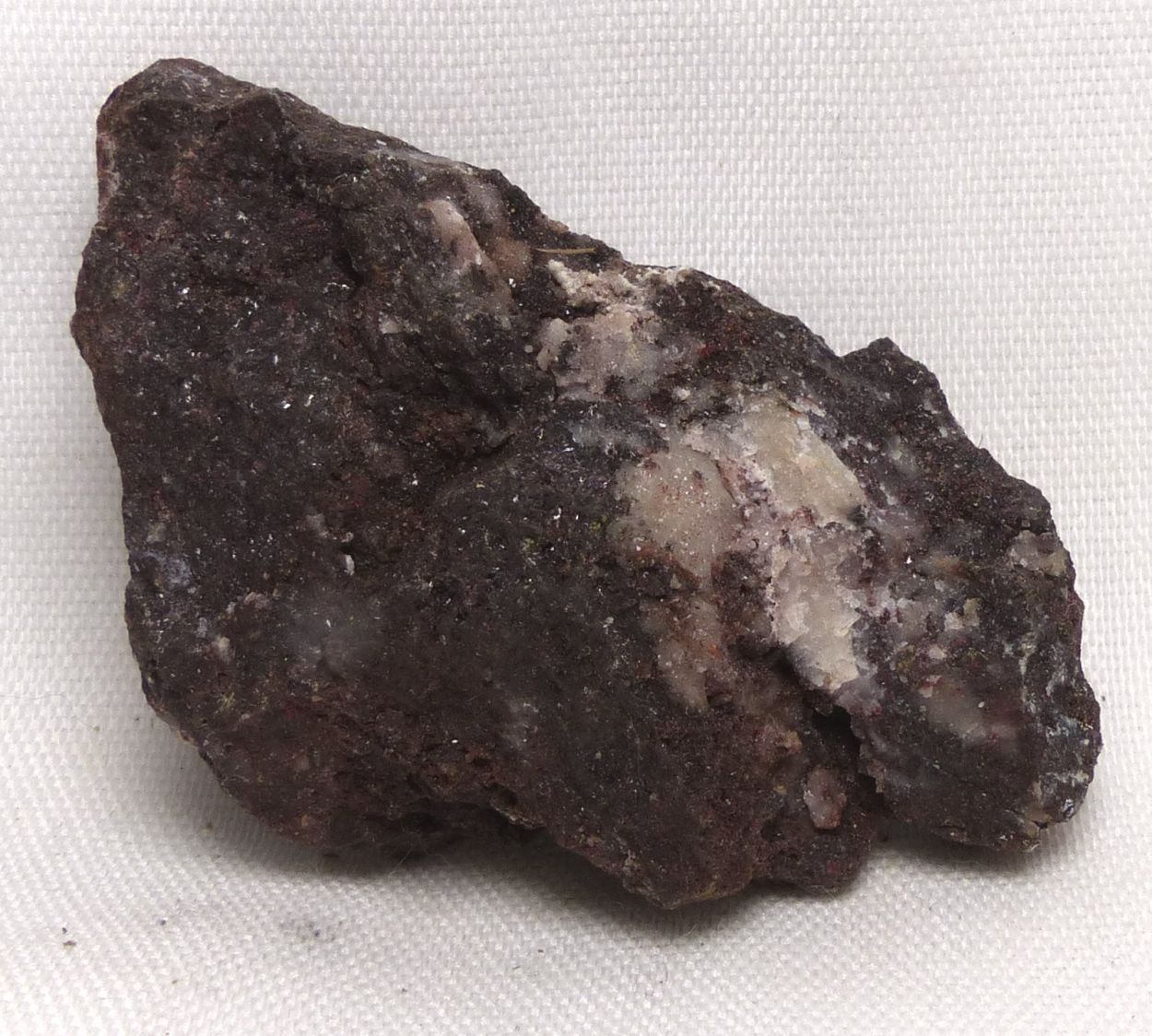 Carminite