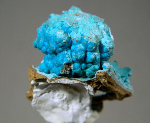 Glaucocerinite