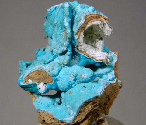 Glaucocerinite