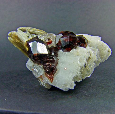 Spessartine & Muscovite On Orthoclase