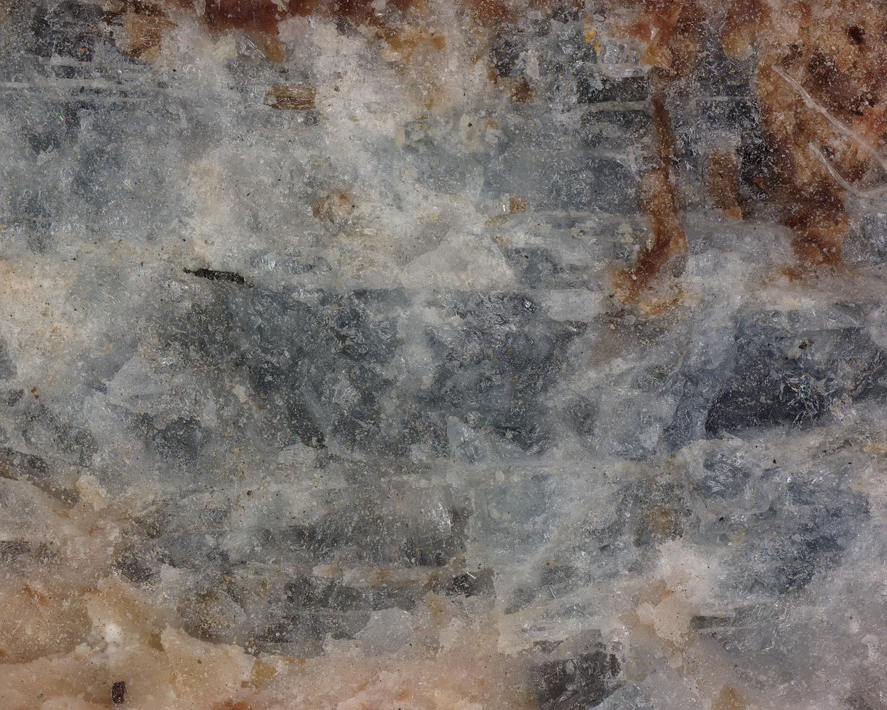 Leucosphenite
