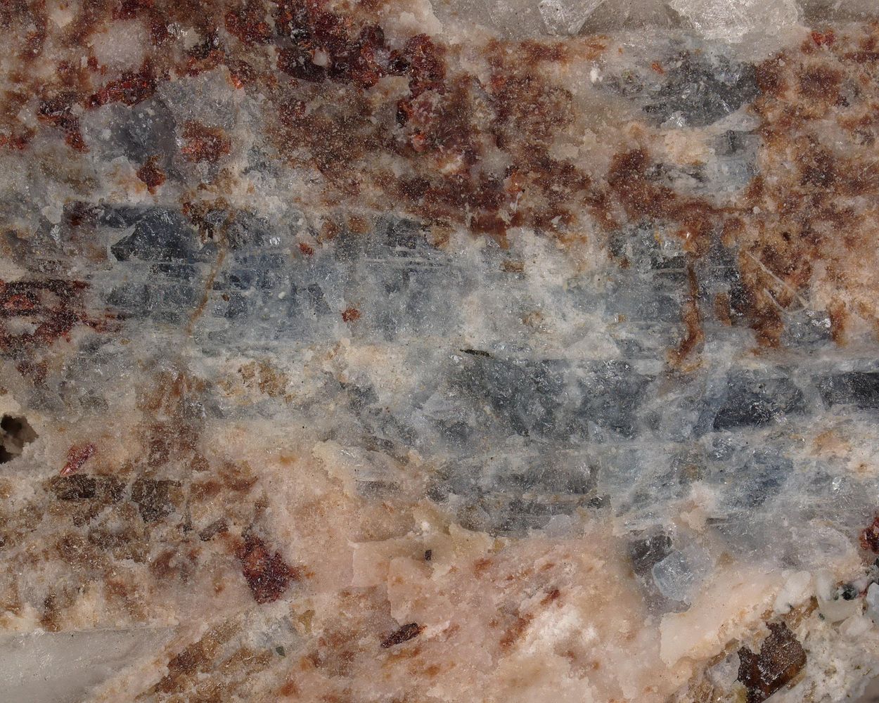 Leucosphenite
