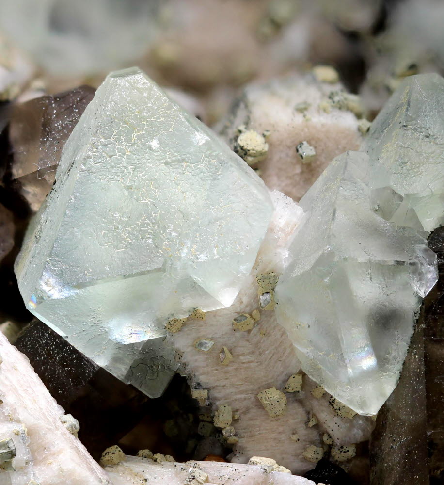 Fluorite On Orthoclase With Smoky Quartz & Spessartine