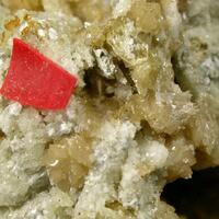 Peatite-(Y) & Ramikite-(Y)