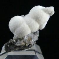 Thomsonite-Ca On Chabazite