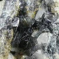 Meneghinite