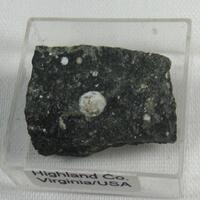 Tacharanite