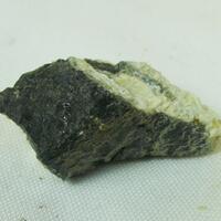 Allanite-(Nd)