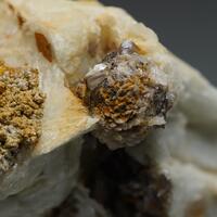Stokesite