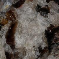 Ganomalite