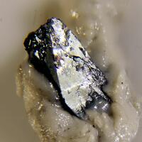 Arcubisite