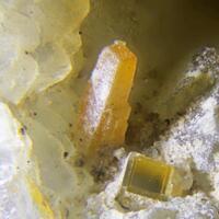 Thomsenolite