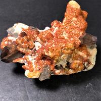 Spessartine On Feldspar With Smoky Quartz