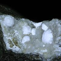 Tacharanite