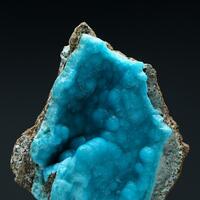 Glaucocerinite