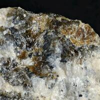 Hundholmenite-(Y)