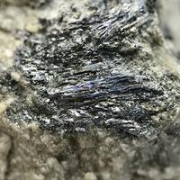 Meneghinite