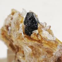 Tapiolite-(Fe)