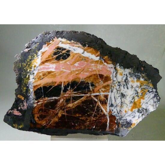 Rhodonite With Tinzenite Braunite & Manganoan Calcite