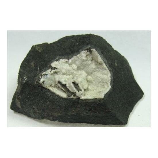 Tacharanite