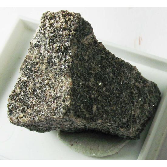 Ganomalite