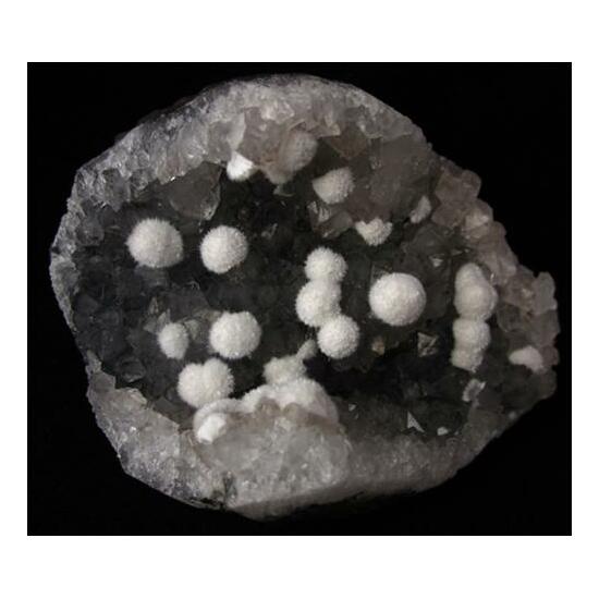 Okenite On Quartz