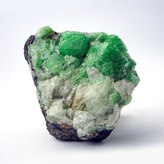 Grossular Var Tsavorite On Graphite