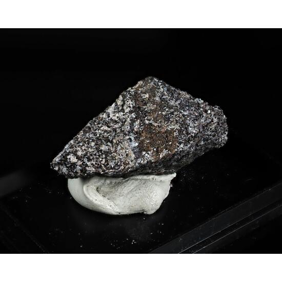 Ganomalite