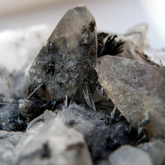 Tochilinite
